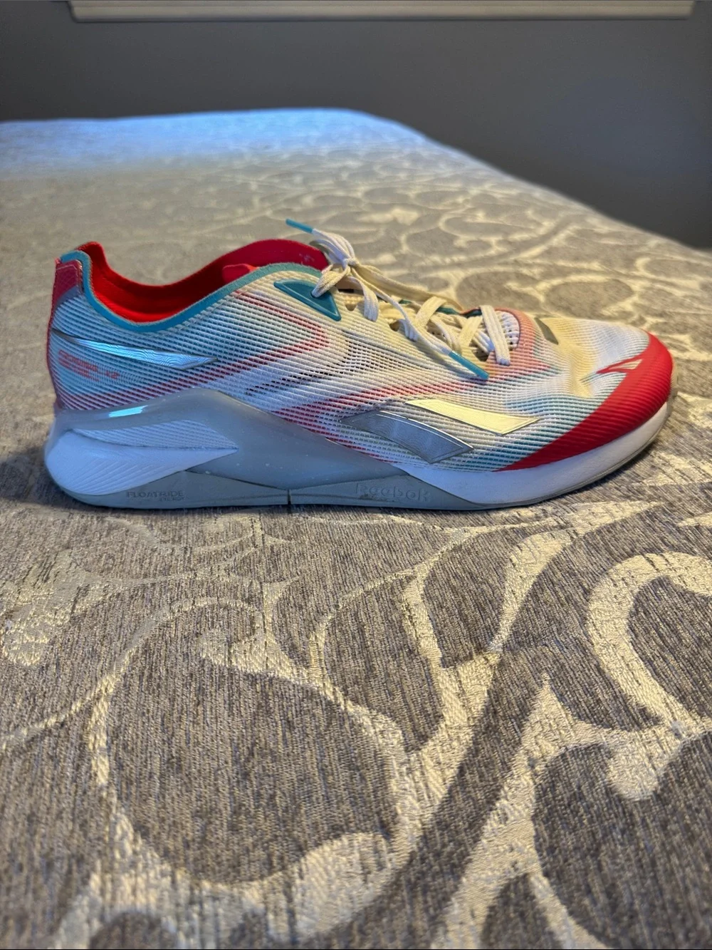 Reebok Nano Froning X2 Men’s White Athletic Sneakers with Red and Blue Accents